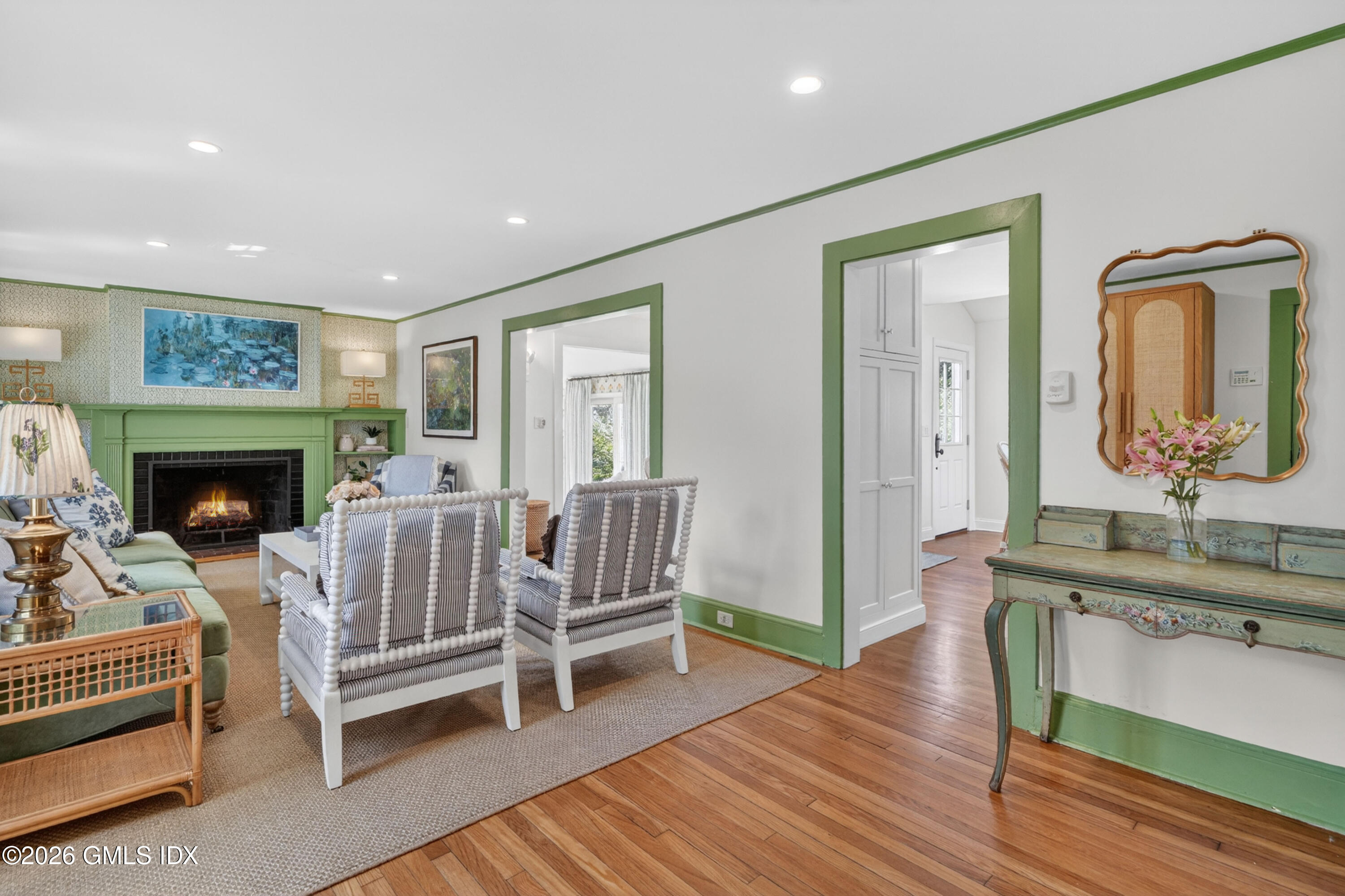 20 Ridge Road Cos Cob, CT 06807 - Photo 5 of 36 a living room with furniture and a fireplace
