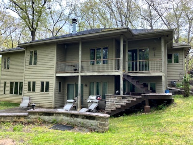 2110 Grand Detour Road Dixon, IL 61021 - Photo 2 of 21 a view of a house with a yard chairs and fire pit