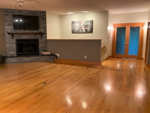 2110 Grand Detour Road Dixon, IL 61021 - Photo 12 of 21 an empty room with windows and a fireplace