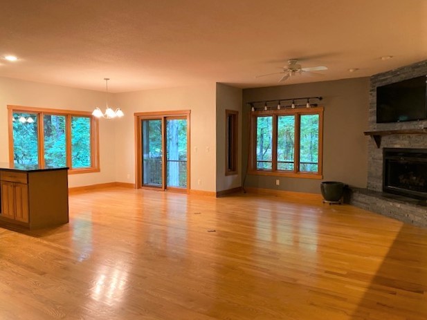 2110 Grand Detour Road Dixon, IL 61021 - Photo 13 of 21 a view of an empty room with a window and kitchen view