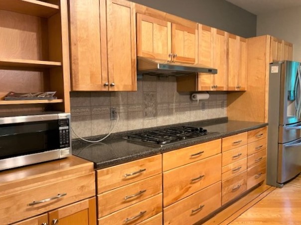 2110 Grand Detour Road Dixon, IL 61021 - Photo 8 of 21 a kitchen with granite countertop a sink a stove and cabinets