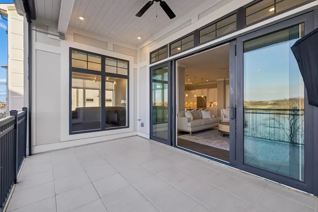a kitchen with sink stove and cabinets