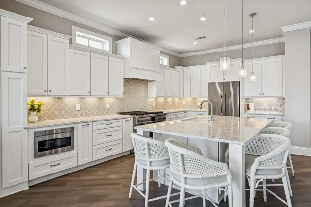 a bedroom with a bed and a table