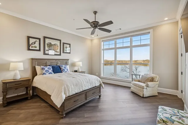 a spacious bathroom with double sink and a large mirror