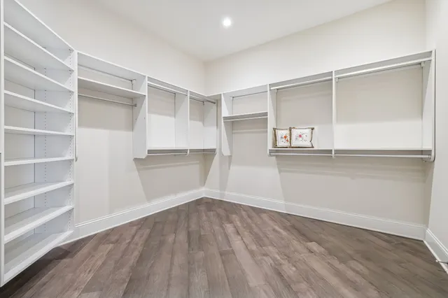a view of an empty walk in closet