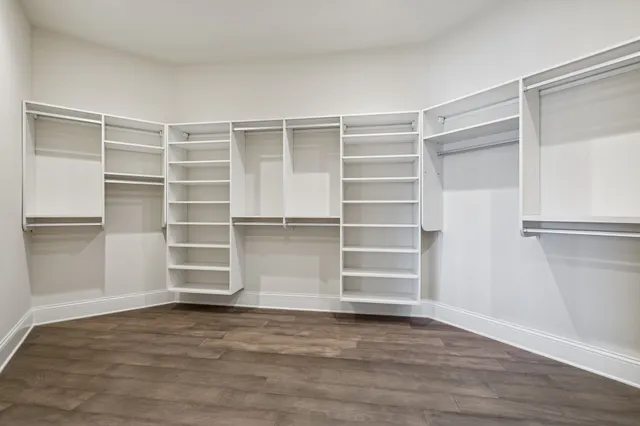 a view of a hallway with a window