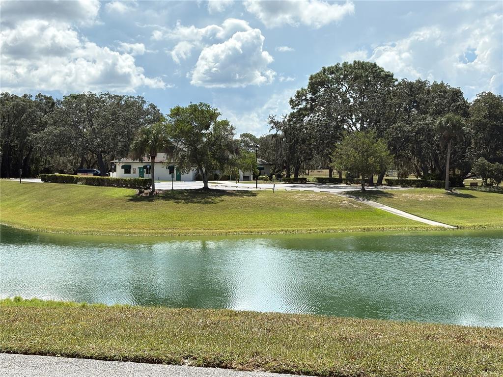 9470 Nakoma Way Weeki Wachee, FL 34613 - Photo 41 of 45 a view of a swimming pool with an outdoor space and seating area