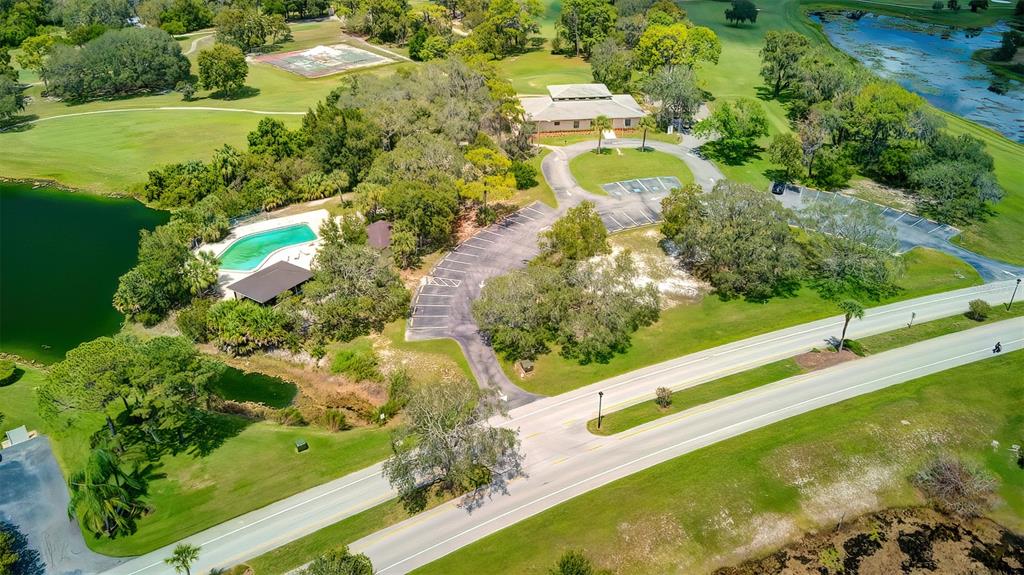 9470 Nakoma Way Weeki Wachee, FL 34613 - Photo 44 of 45 a view of a lake with a yard