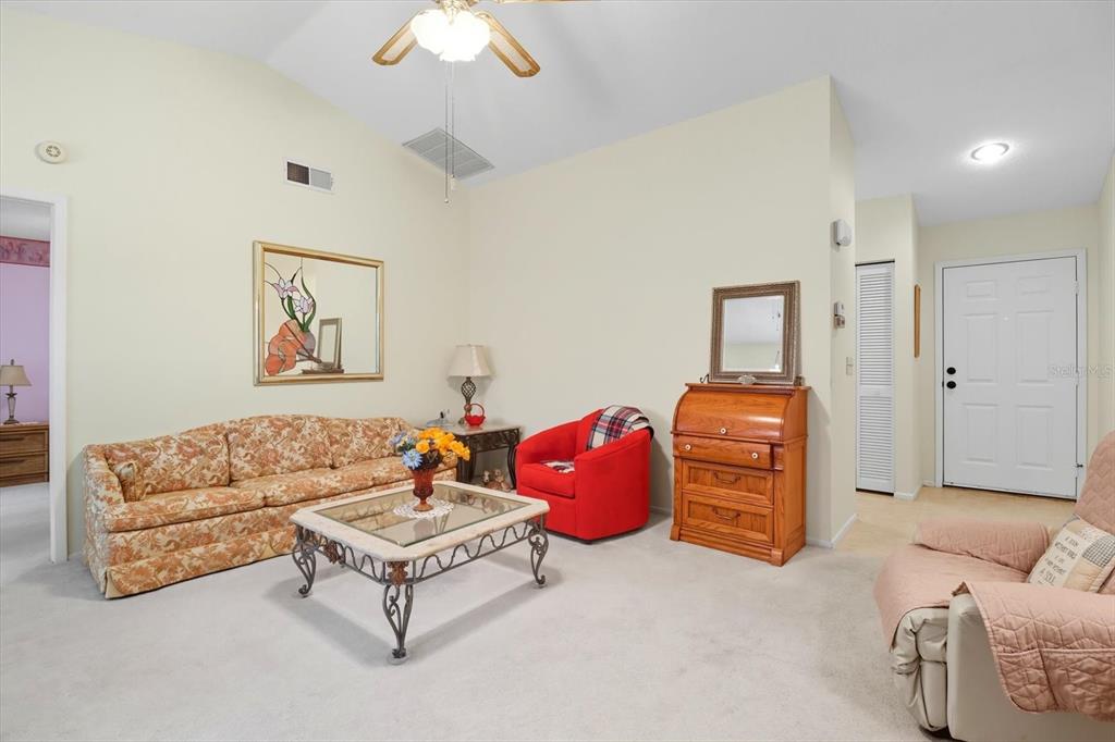 9470 Nakoma Way Weeki Wachee, FL 34613 - Photo 6 of 45 a living room with furniture
