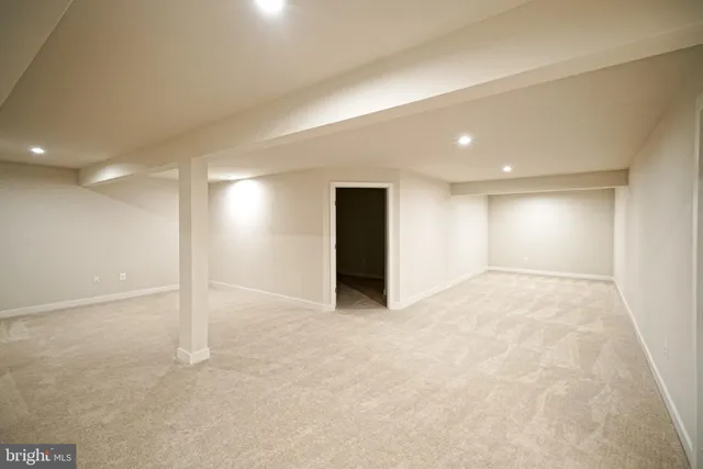 a bathroom with a sink toilet vanity and shower