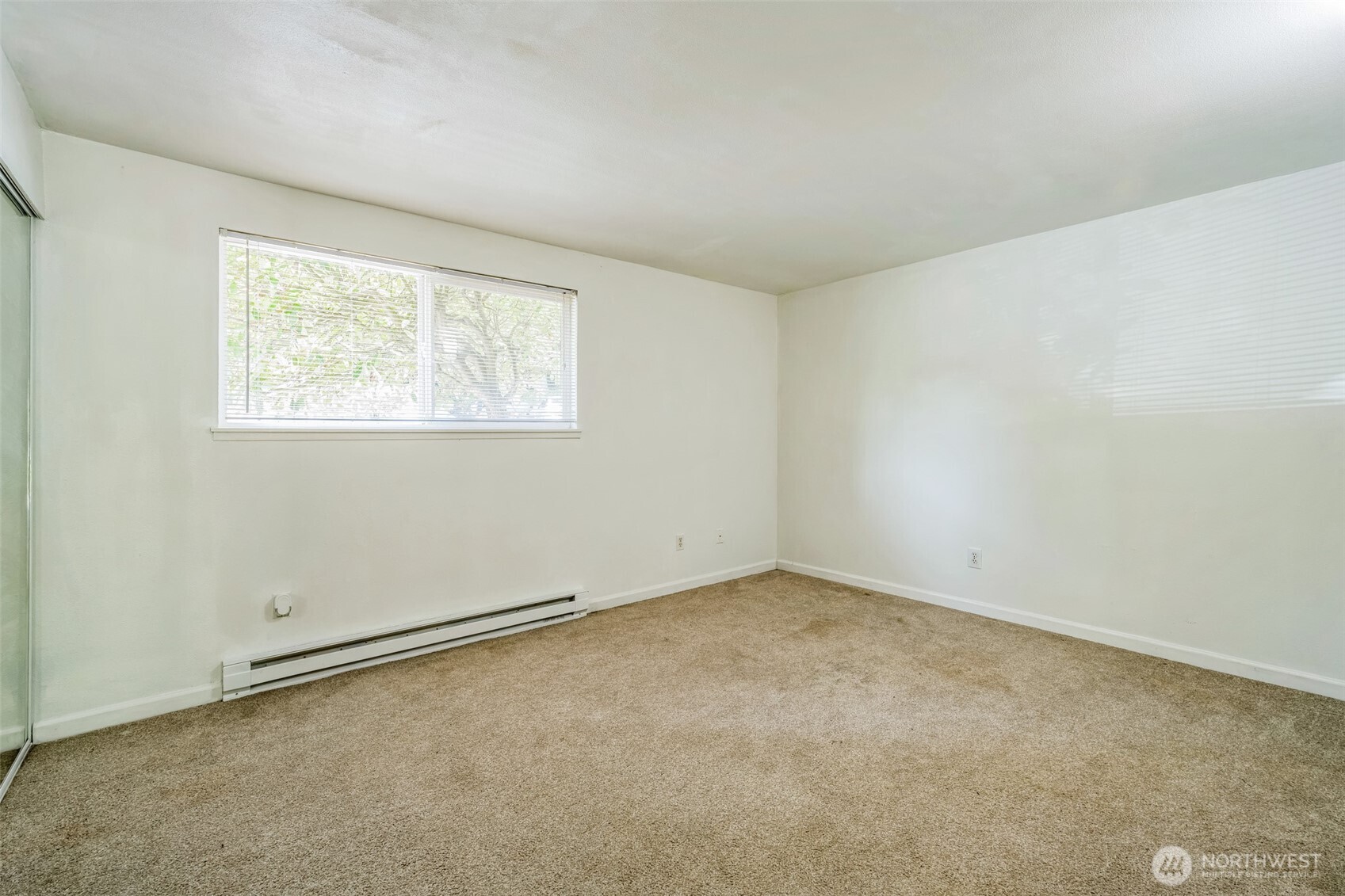 7311 224th Street Southwest, Unit C5 Edmonds, WA 98026 - Photo 19 of 28 an empty room with a window