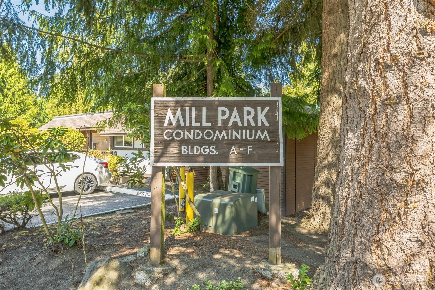 7311 224th Street Southwest, Unit C5 Edmonds, WA 98026 - Photo 24 of 29 a sign on the side of the road