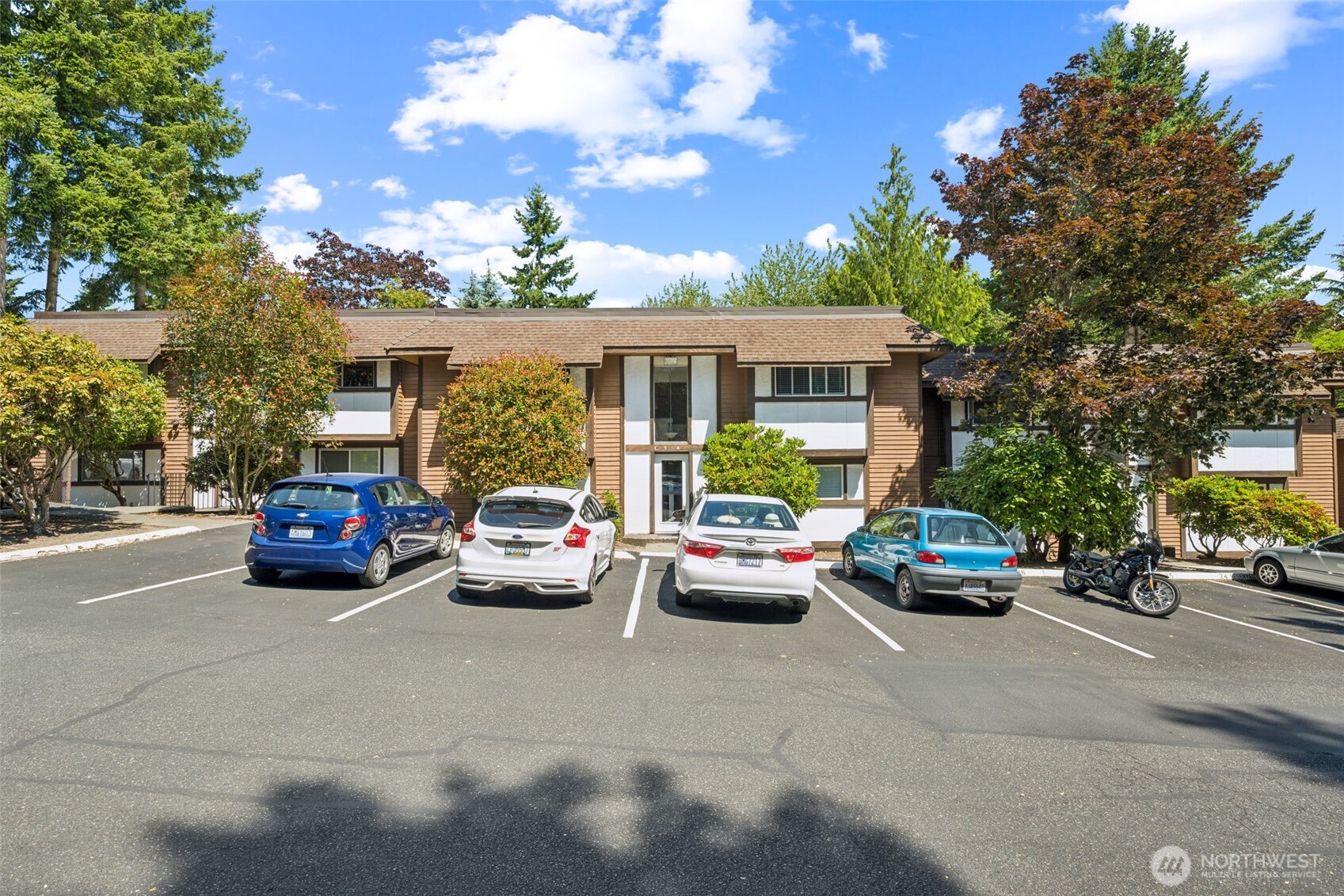 7311 224th Street Southwest, Unit C5 Edmonds, WA 98026 - Photo 24 of 28 a cars parked in front of a house