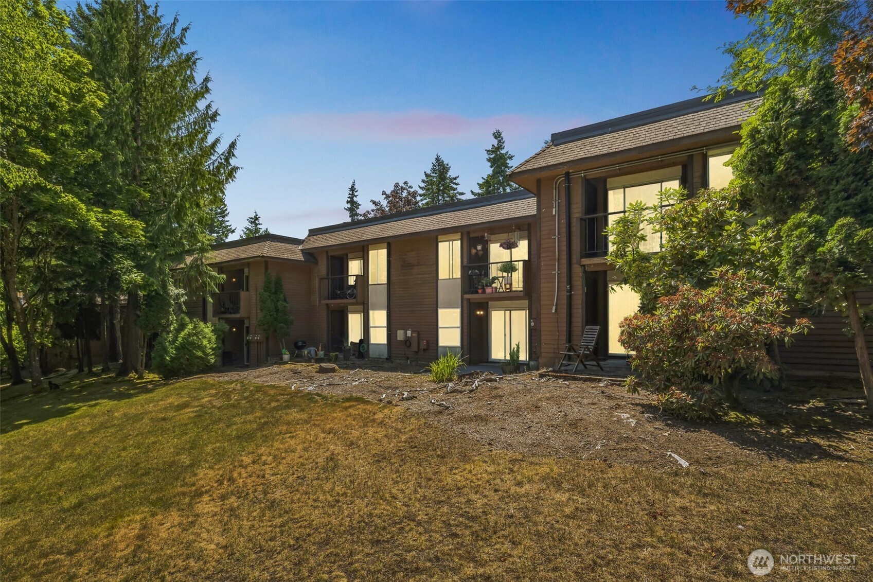 7311 224th Street Southwest, Unit C5 Edmonds, WA 98026 - Photo 27 of 28 a front view of a house with a yard
