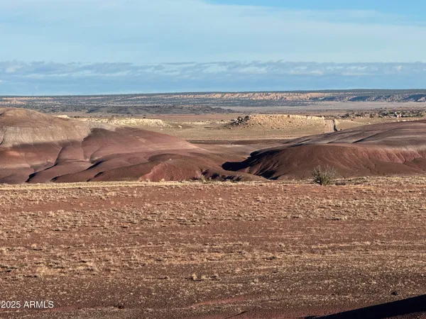 a view of beach and an ocean