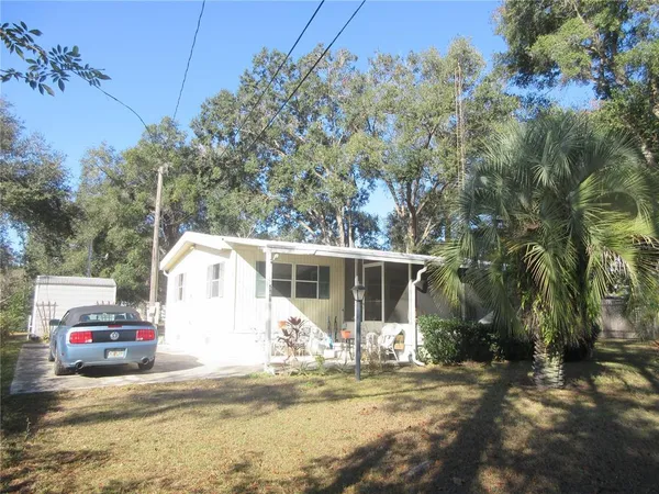 a view of a house with a patio