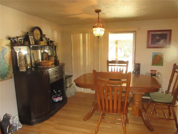 a room with a table and a window