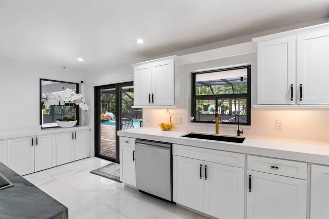 a bathroom with a double vanity sink mirror and double