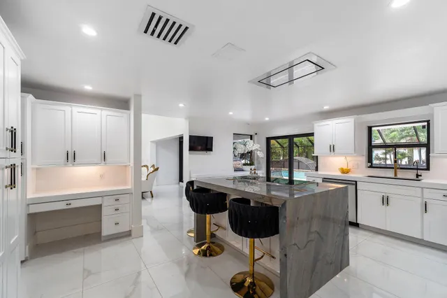 a bed room with a bed and a television