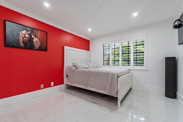 a bed room with furniture and a fireplace