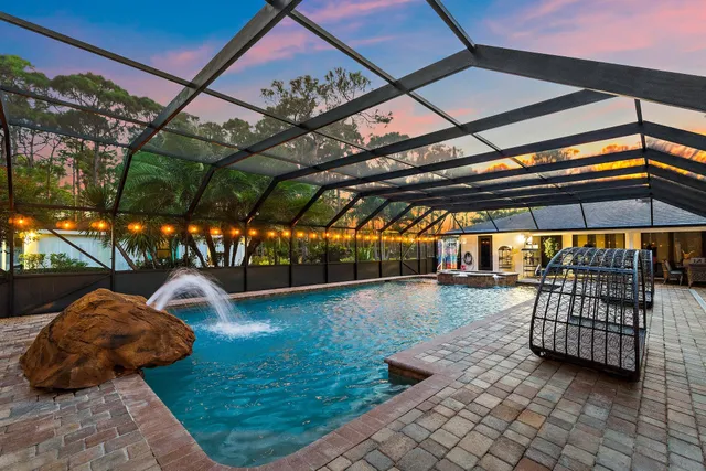 a view of a street with a bench in front of it