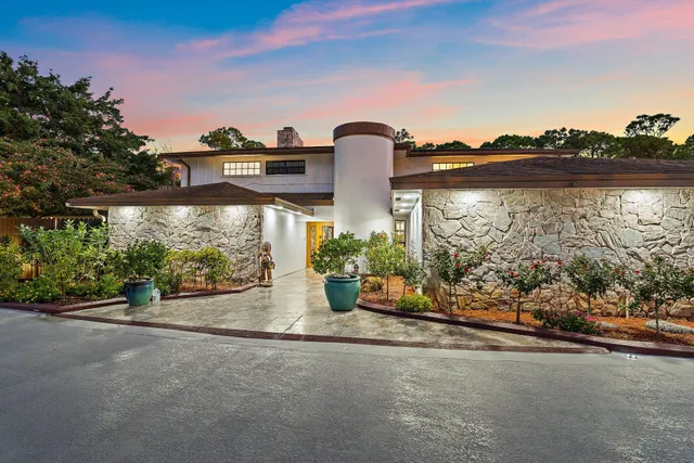 a view of a street with a building in the background