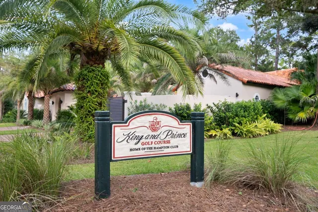 a street sign on a pole on a road
