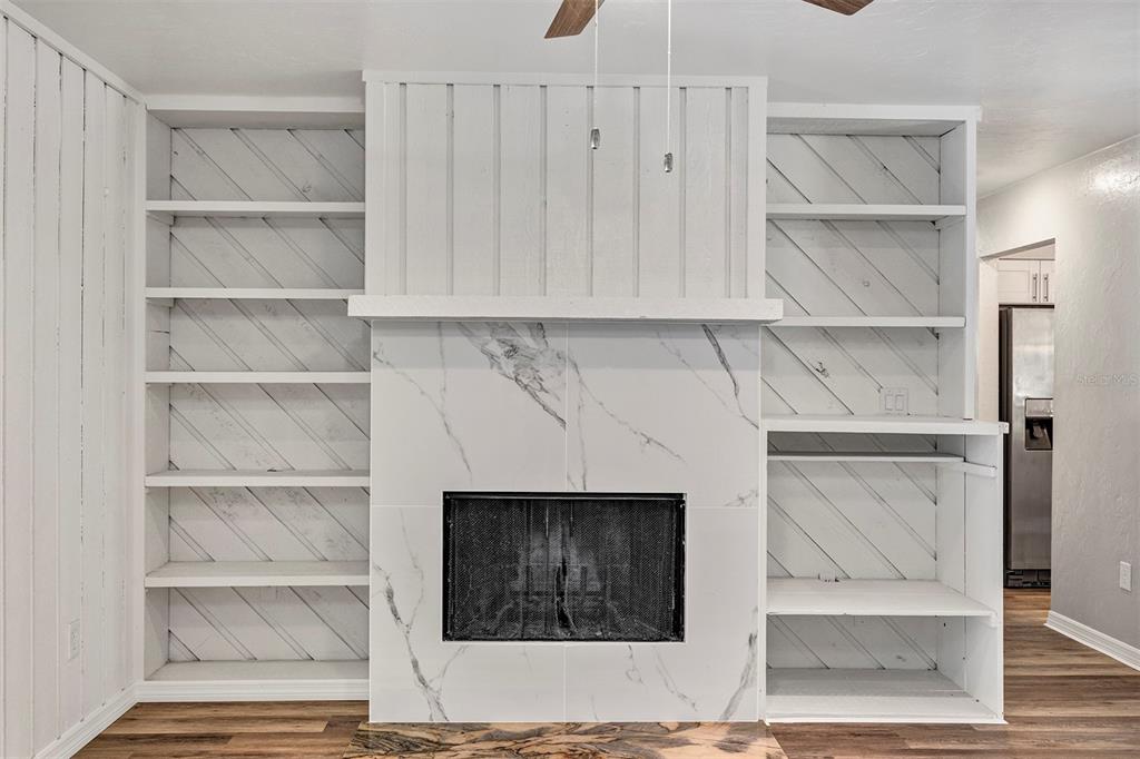 309 Southwest 77th Terrace Gainesville, FL 32607 - Photo 18 of 59 a view of walk in closet with empty racks