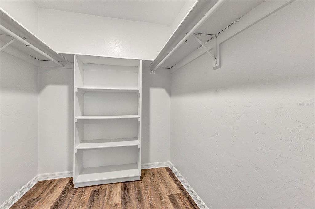 309 Southwest 77th Terrace Gainesville, FL 32607 - Photo 23 of 59 a view of walk in closet with empty racks