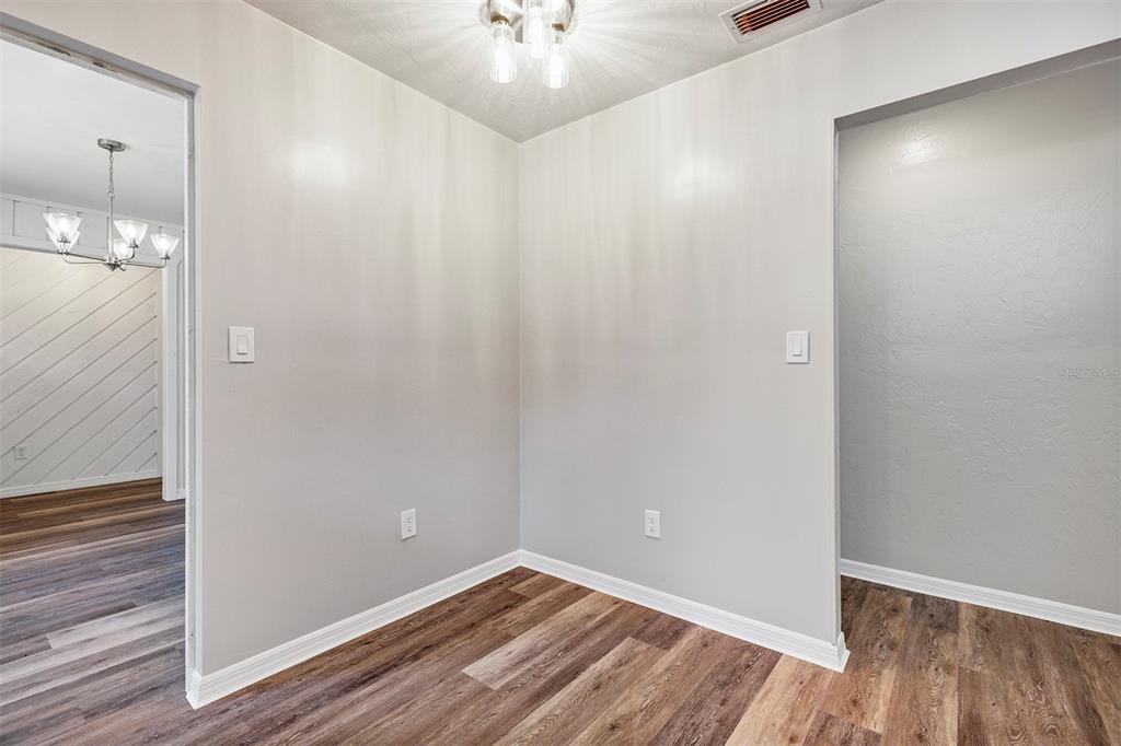 309 Southwest 77th Terrace Gainesville, FL 32607 - Photo 31 of 59 wooden floor in an empty room