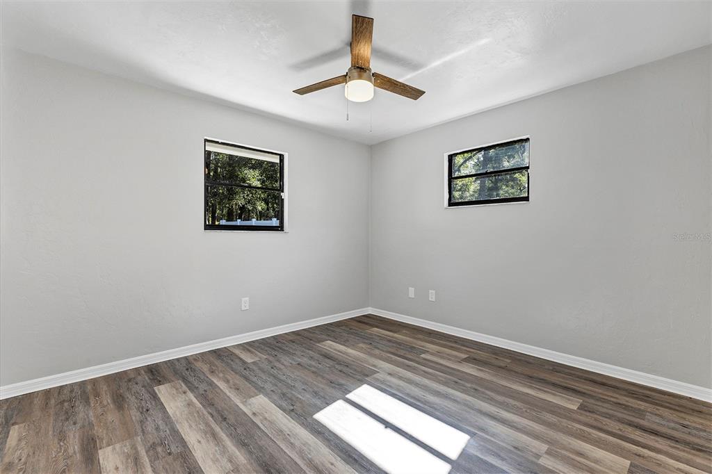 309 Southwest 77th Terrace Gainesville, FL 32607 - Photo 36 of 59 a view of an empty room with a window