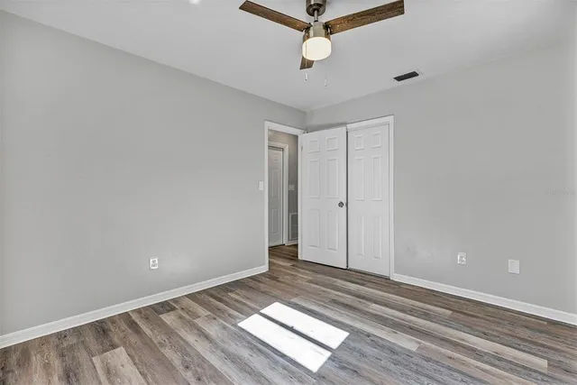 a view of outdoor space kitchen and wooden floor
