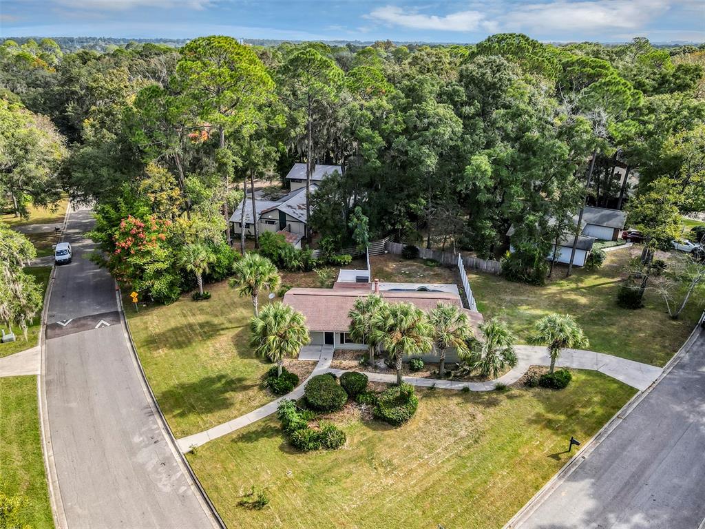 309 Southwest 77th Terrace Gainesville, FL 32607 - Photo 50 of 59 a view of a swimming pool with a patio