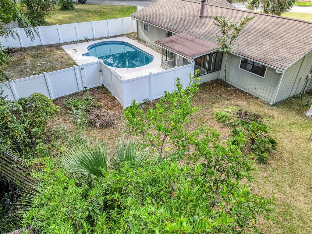 309 Southwest 77th Terrace Gainesville, FL 32607 - Photo 53 of 59 a view of a house with a sink and yard
