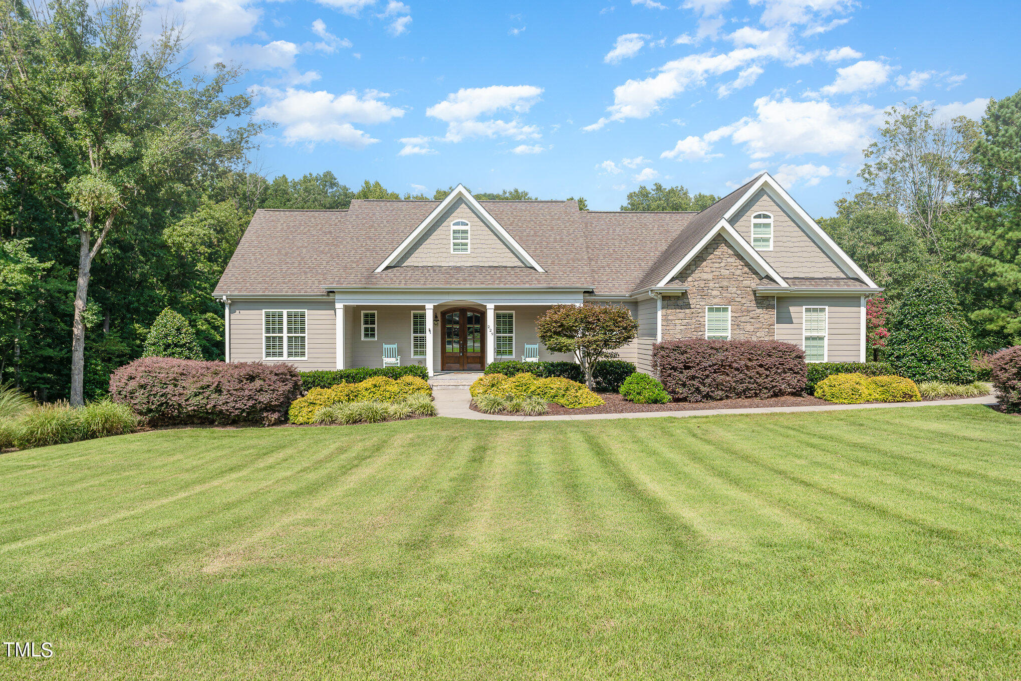 229 Robbins Road Durham, NC 27703 - Photo 1 of 26 a front view of a house with yard porch and green space