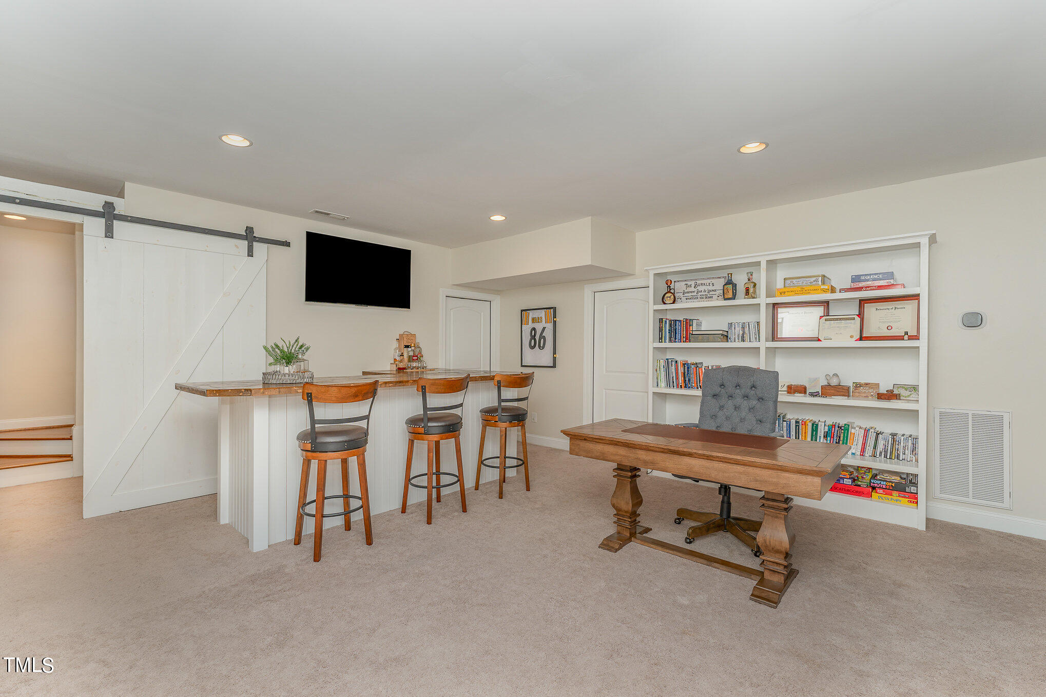 229 Robbins Road Durham, NC 27703 - Photo 23 of 26 a reading room with furniture and a flat screen tv