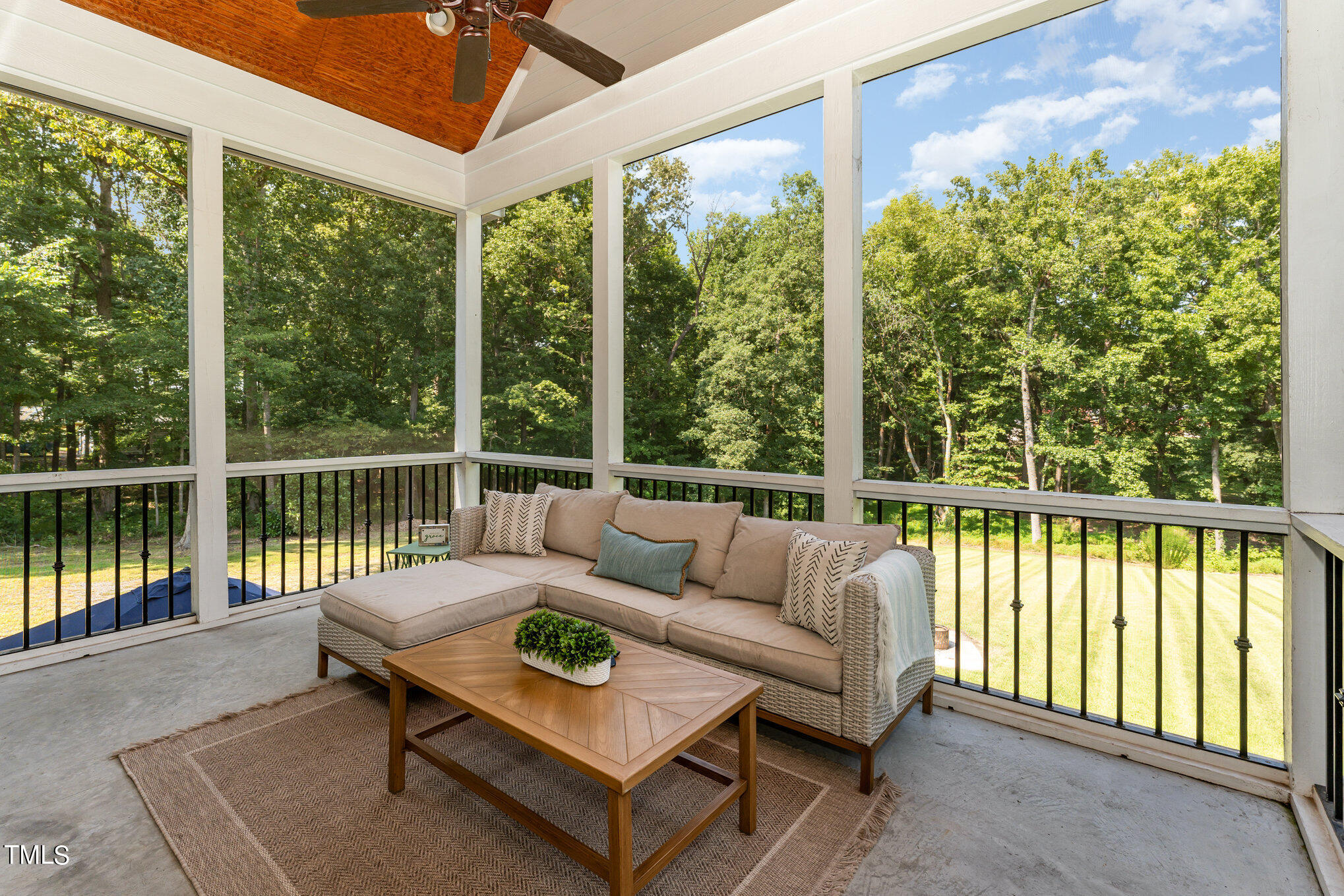 229 Robbins Road Durham, NC 27703 - Photo 8 of 26 a balcony with furniture and a potted plant