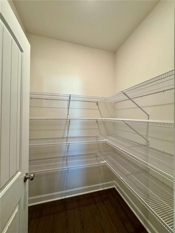 6346 Pine Ridge Point Lula, GA 30554 - Photo 14 of 26 a view of a room with wooden floor