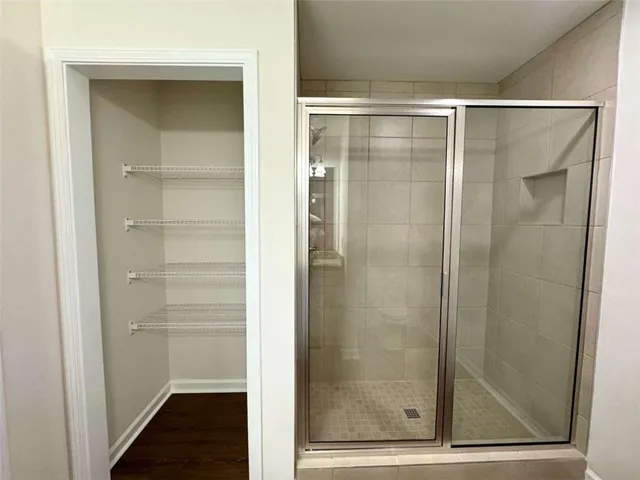 a view of a room with racks on the wall