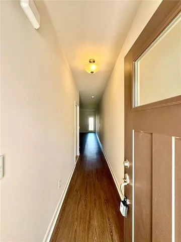 a view of a kitchen with a sink and a window