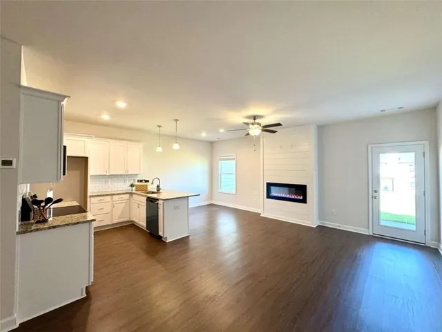 a living room with a fireplace