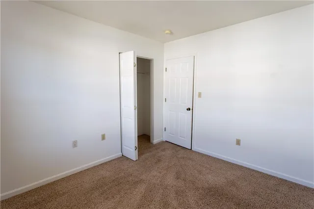 an empty room with an entryway