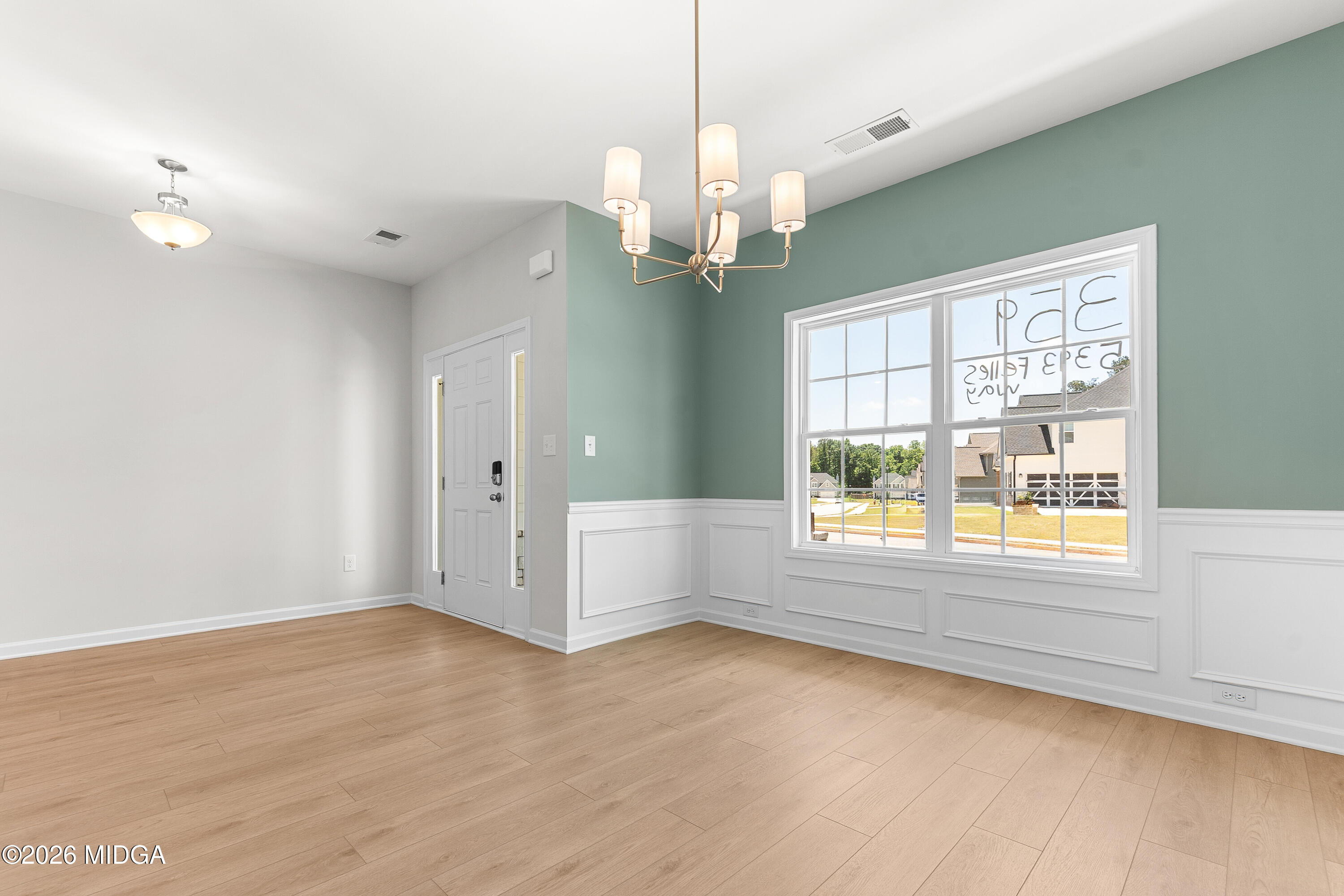 5393 Felles Way, Unit 359 Forsyth, GA 31029 - Photo 7 of 54 a view of an empty room with a window