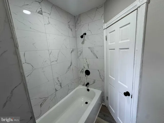 a bathroom with a bathtub