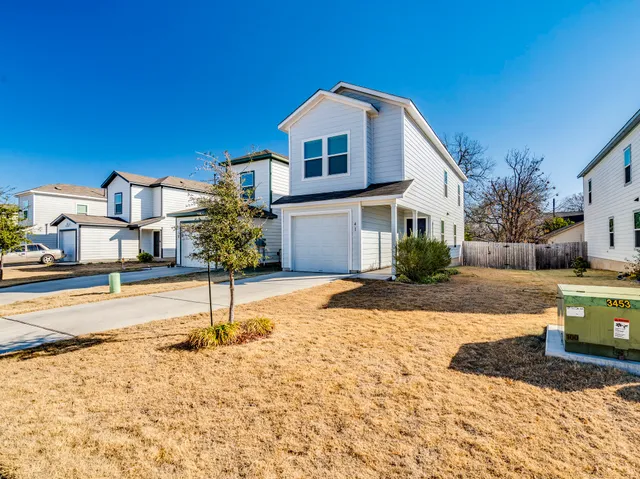 a house with trees in front of it