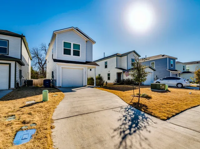 a view of a house with swimming pool