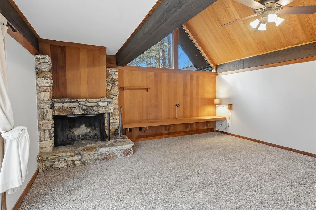 39 Graeagle Meadows Road, Unit 39 Graeagle, CA 96103 - Photo 10 of 48 a view of a livingroom with an empty space and a fireplace