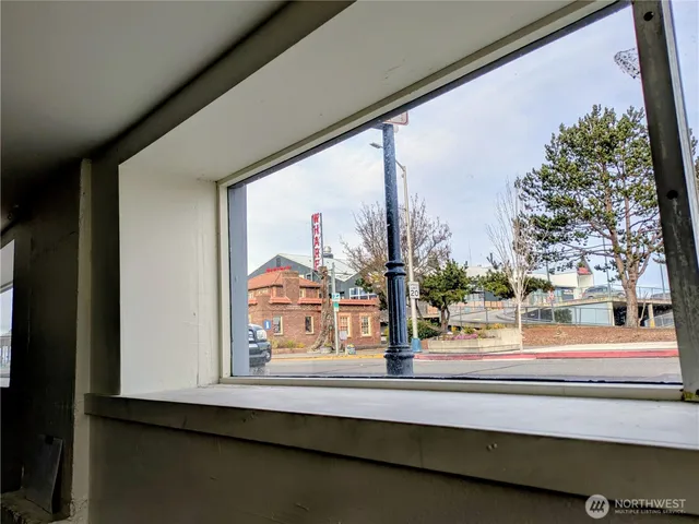 a view of a door and a window