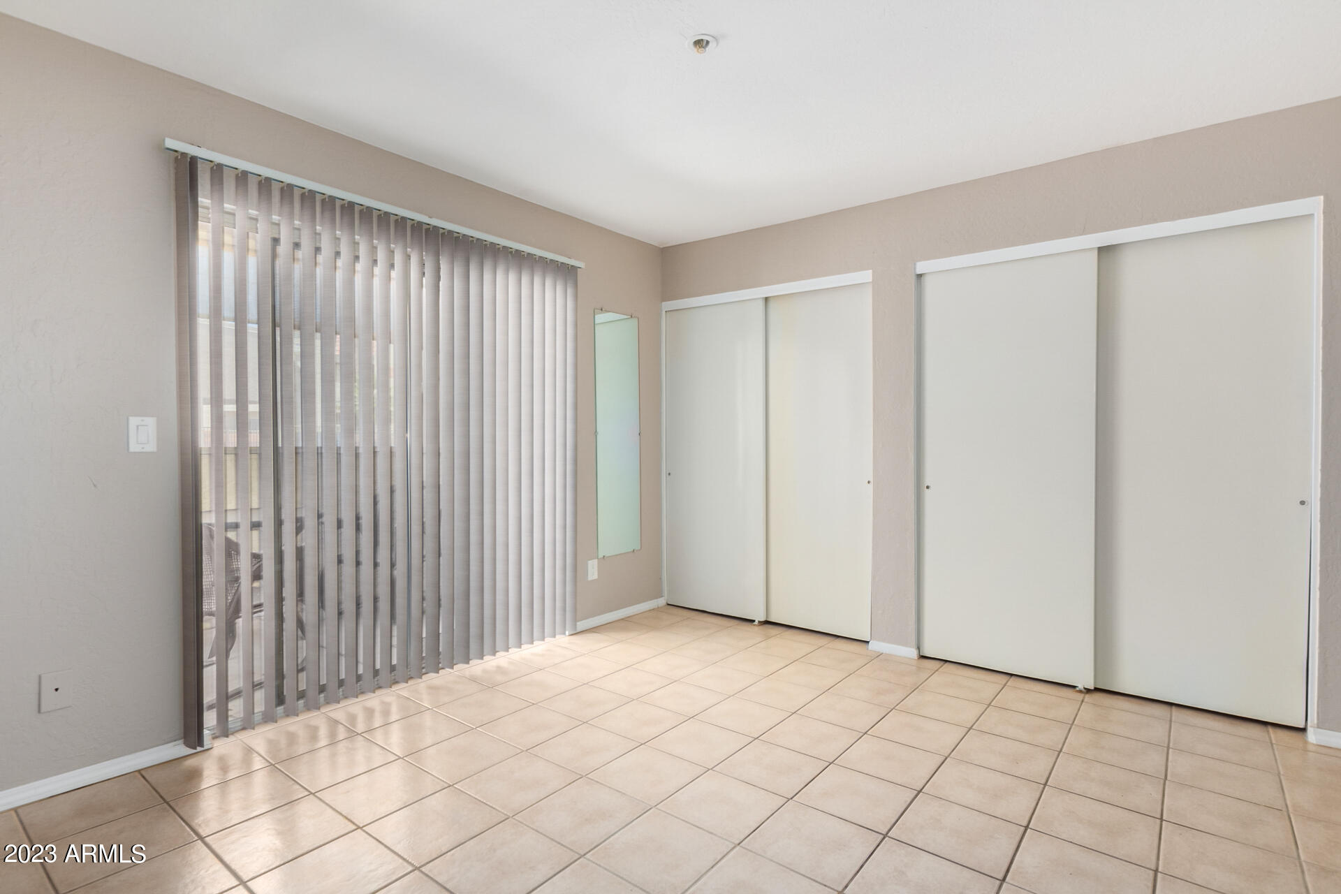 12123 West Bell Road, Unit 129 Surprise, AZ 85378 - Photo 14 of 21 Bedroom with Slider