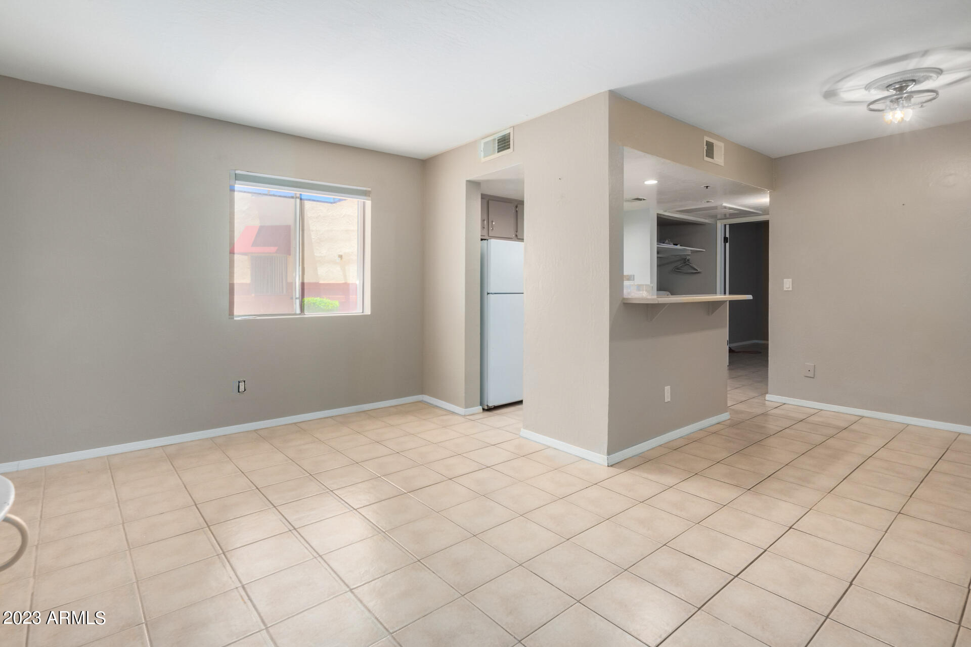 12123 West Bell Road, Unit 129 Surprise, AZ 85378 - Photo 6 of 21 Spacious Living and Dinind